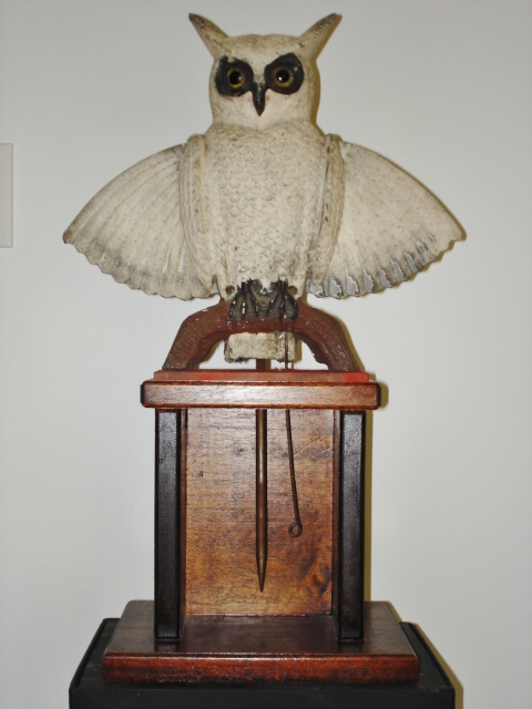 OWL DECOY  WITH MOVABLE WINGS.
