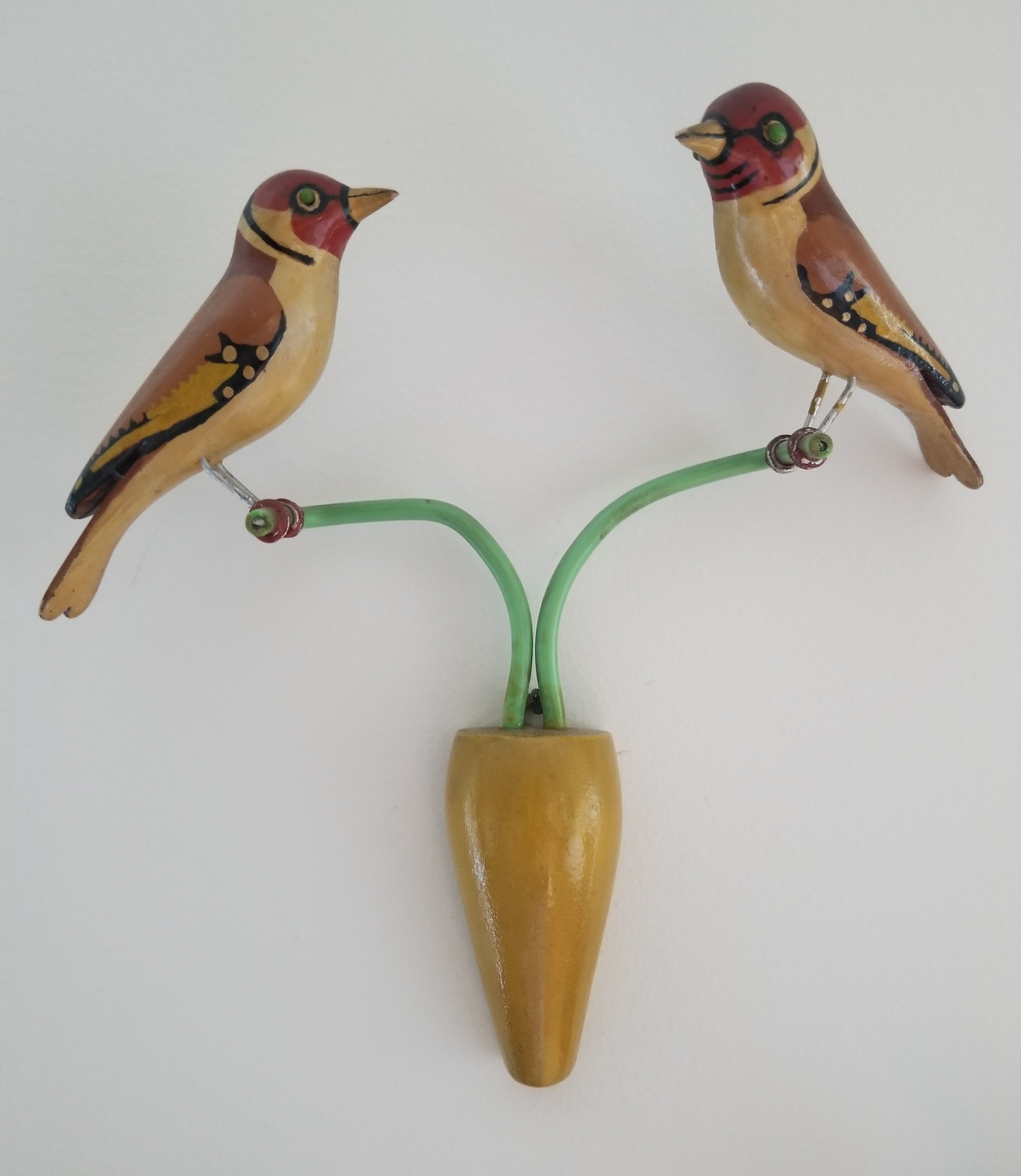 UNUSUAL PAIR OF YELLOW BIRDS ON AN URN