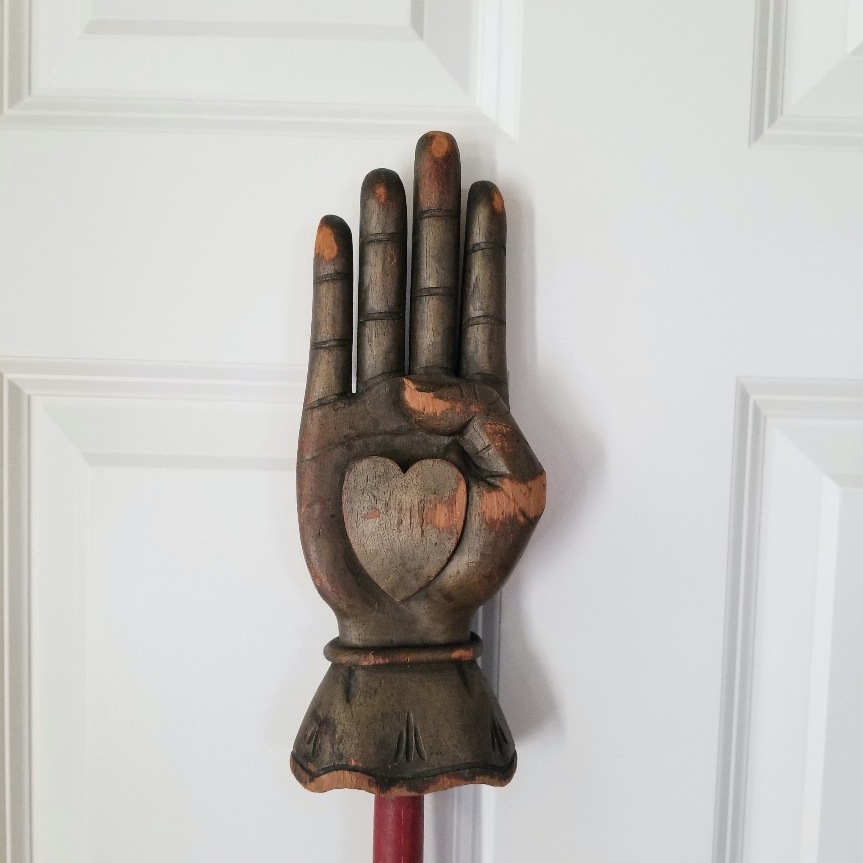 WOOD CARVED LODGE HEART AND HAND 