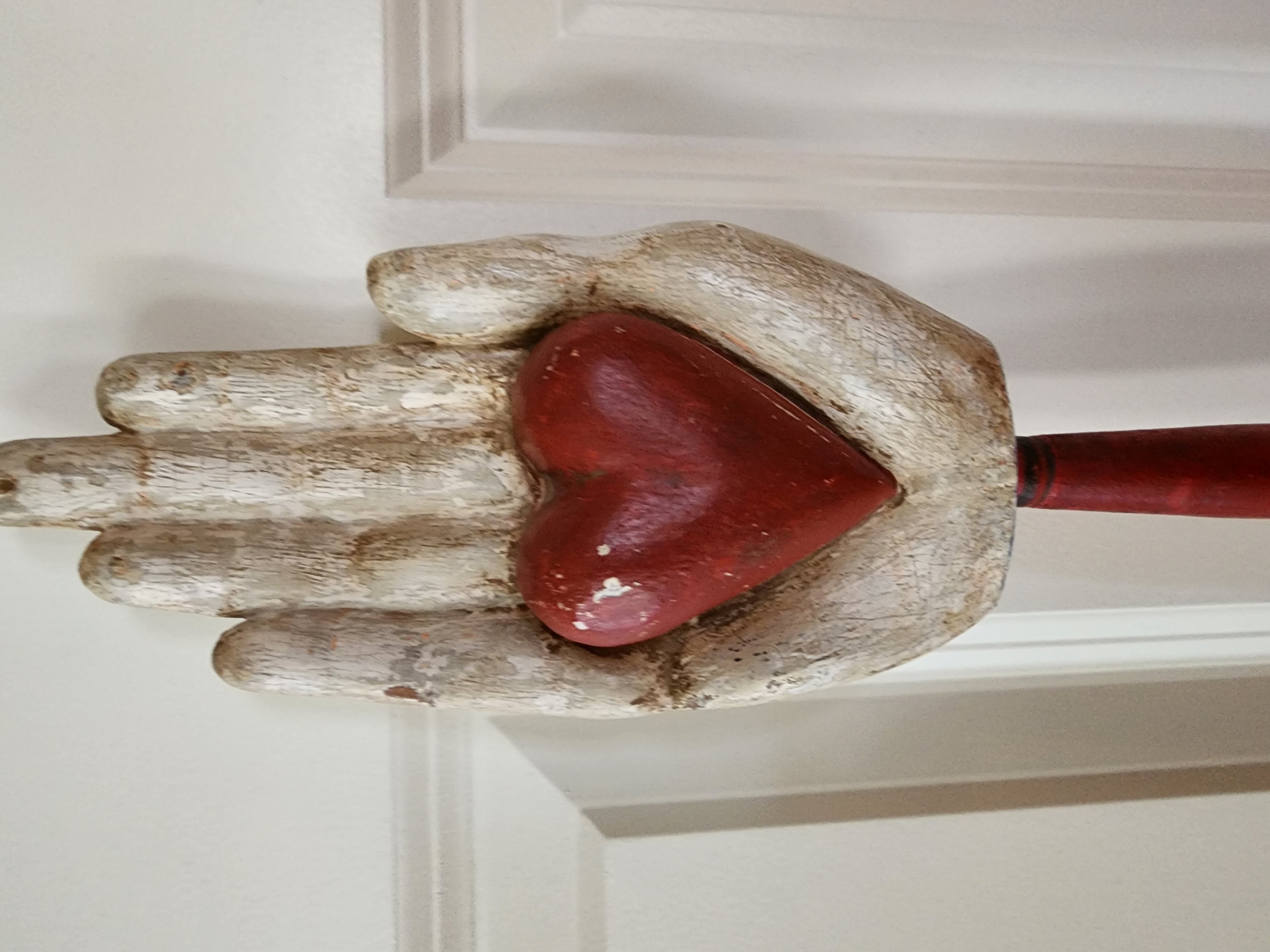 WOOD CARVED HEART IN HAND 