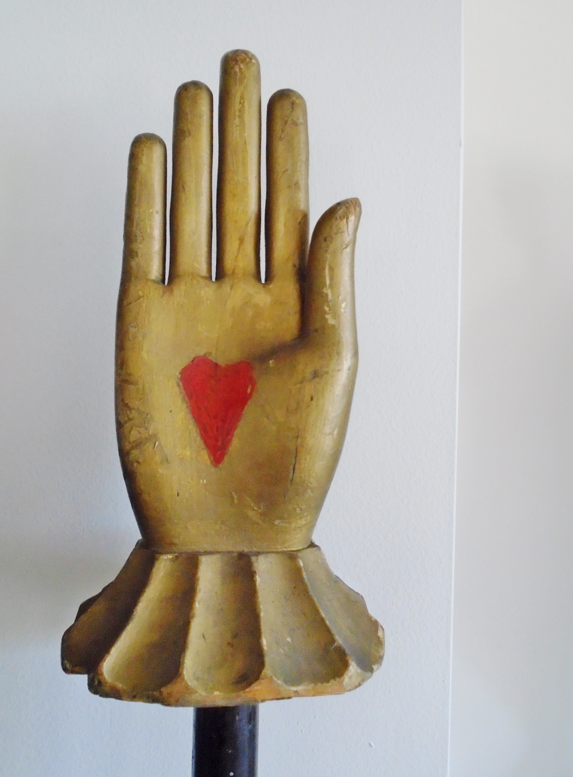 CARVED HEART IN HAND