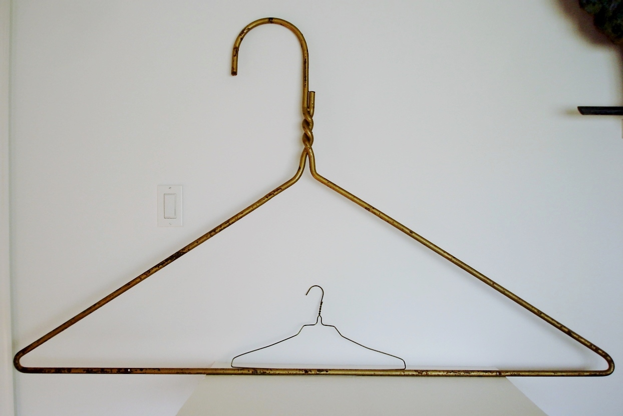 4 FT. +  IRON CLOTHES HANGER IN PAINT