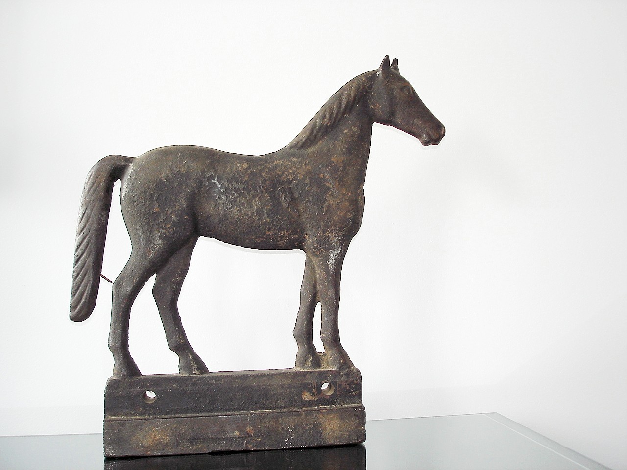 CAST IRON LONG TAIL HORSE 