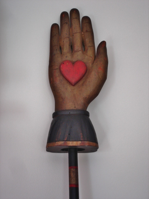 HEART IN HAND WITH CARVED HEART