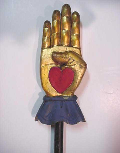 WOODEN CARVED LODGE HEART IN HAND
